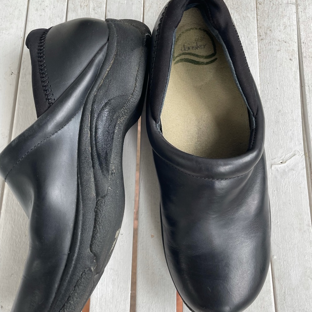 Dansko Women’s Black Leather Clogs